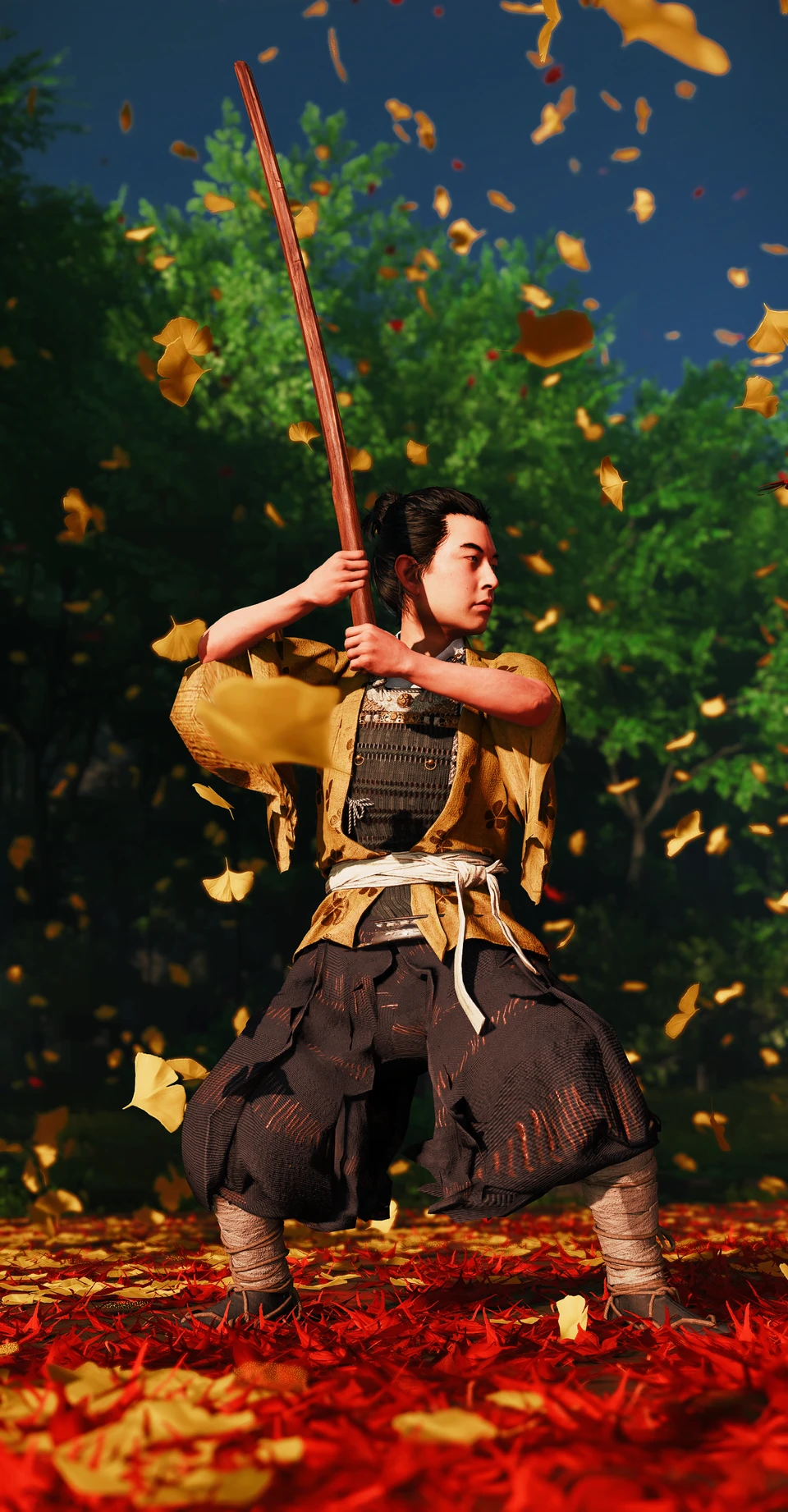Samurai holding a sword raised beside his head, surrounded by falling autumn leaves